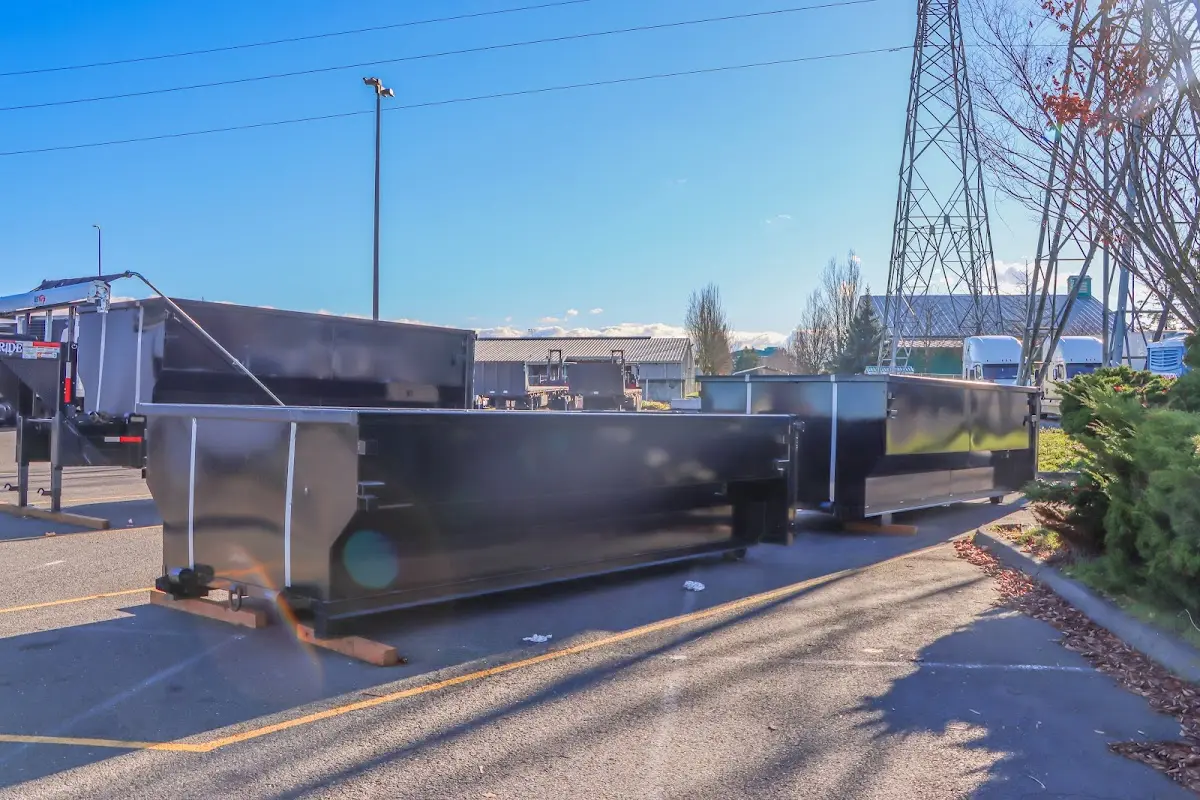 Roll-off dumpster ready for waste disposal at job site for Roll Off Dumpster Rental in Hampstead